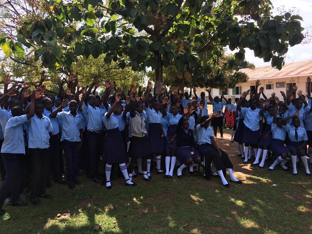Pupils lined up to receive copies of the Holy Bible